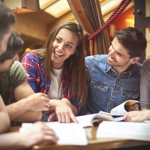 Student sharing her knowledge with her colleagues